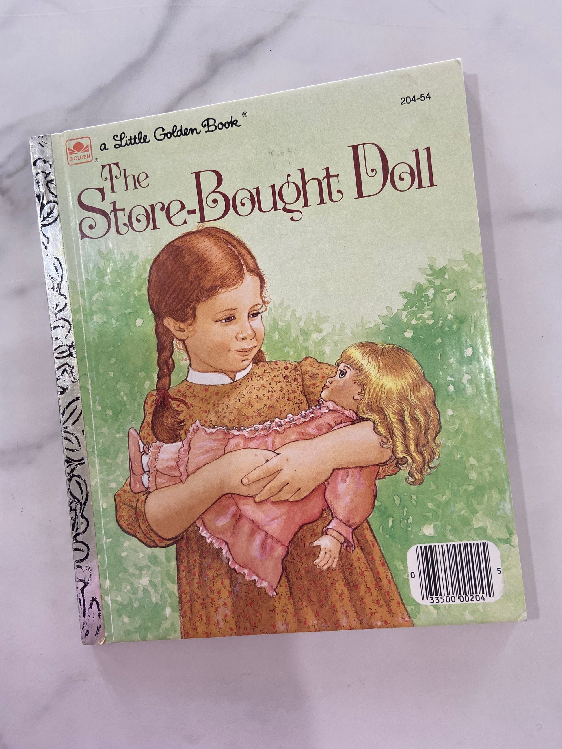 #1117 LW Store Bought Doll Golden Book